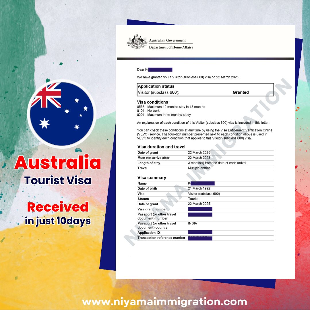 A person holding up an approved visa documen