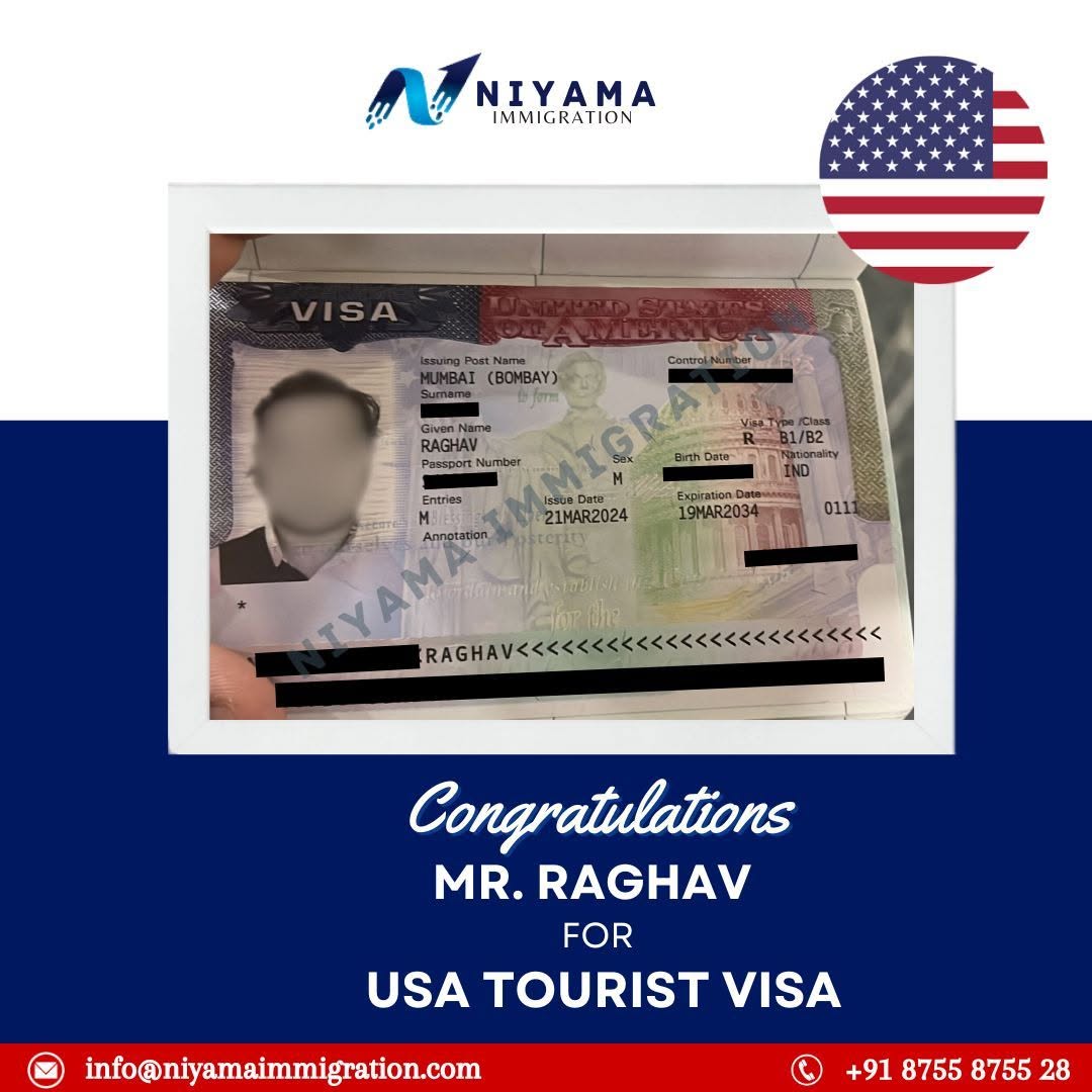 A person holding up a visa approval letter